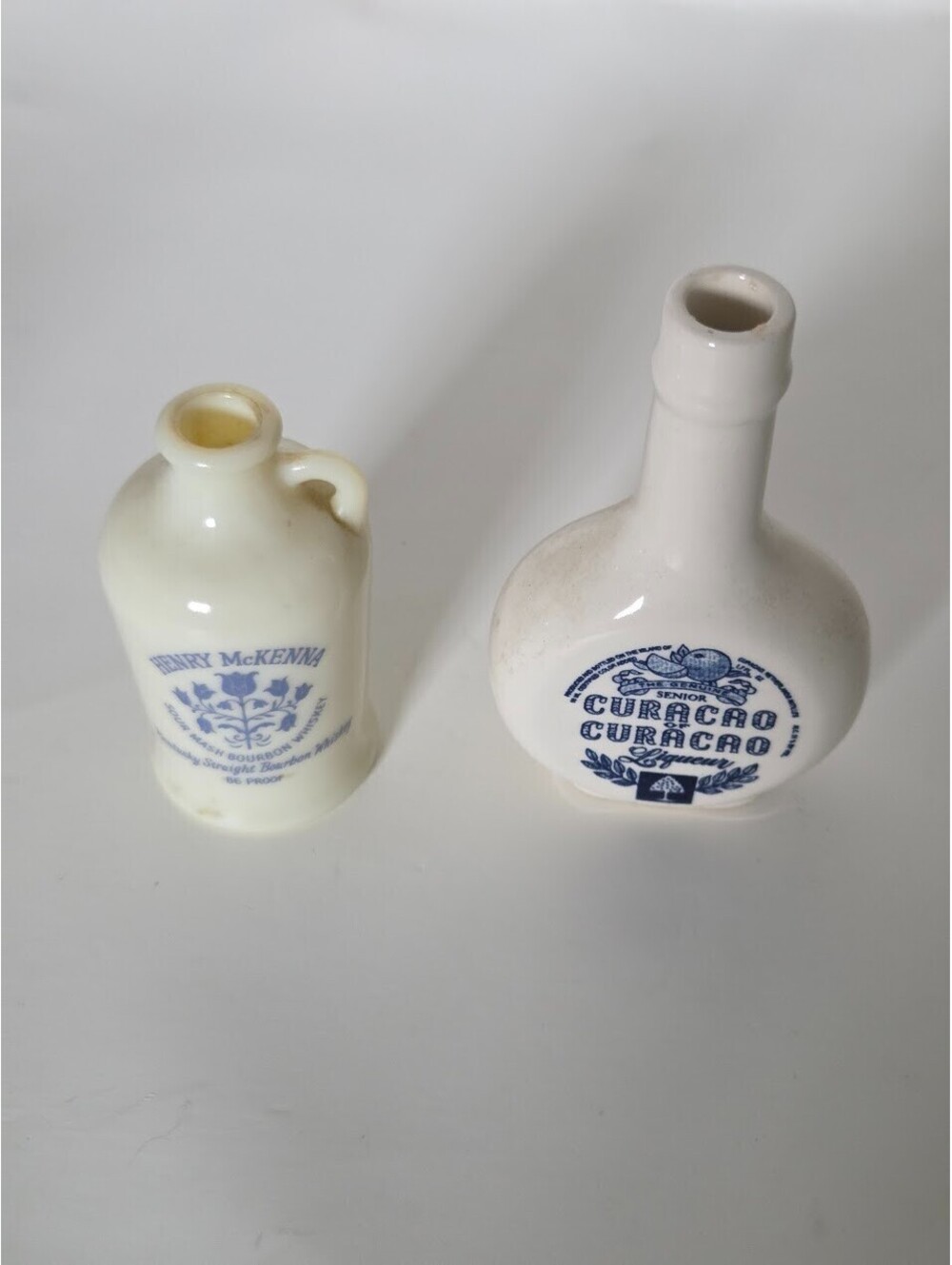 Vintage Miniature Stoneware Liquor Bottles Henry McKenna & Curacao Pair